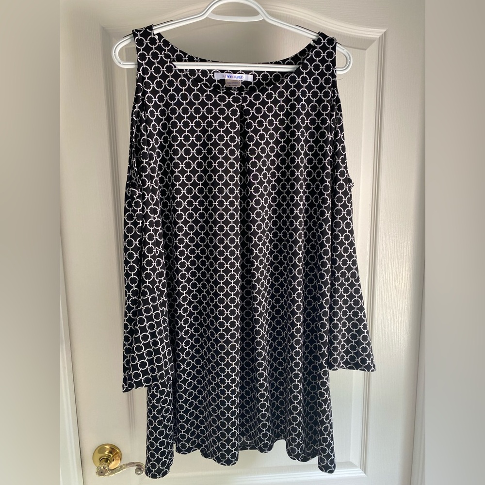 Peter Nygard Black and White Cold Shoulder Patterned Top with bell sleeves.